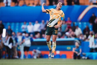 Sam Kerr atuando pela Seleção Australiana Feminina.